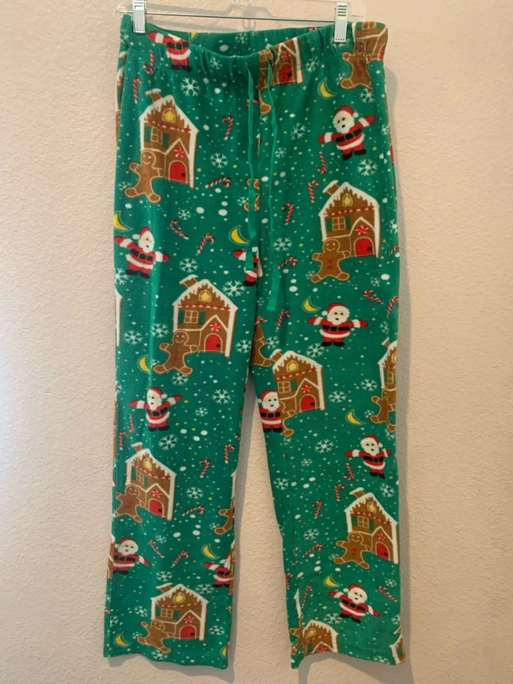 Green Holiday Pajama. 2 Pants with Santa & Gingerbread Print NWOT  1 Lg / 1 Med.